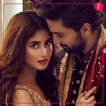 Sajal Aly and Ahad Raza Mir posing with Romance in the air