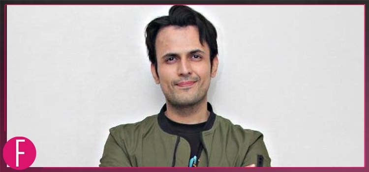 Usman Mukhtar in Brown jacket